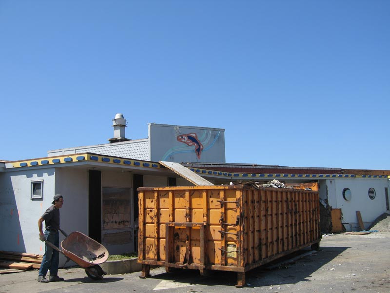 demolition begins in front of the future Sam's Chowder House