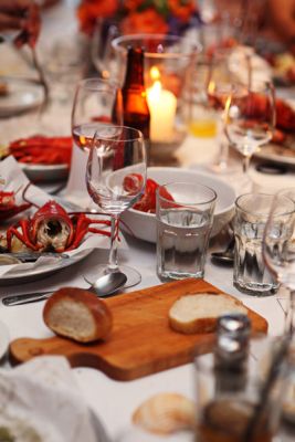 Candlelit lobster clambake dining table