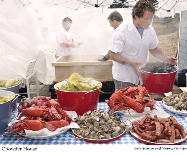 Executive Chef and Partner Lewis Rossman serves Sam's famous Lobster Clambake at an event