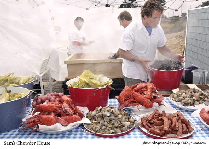 Executive Chef and Partner Lewis Rossman serves Sam's famous Lobster Clambake at an event